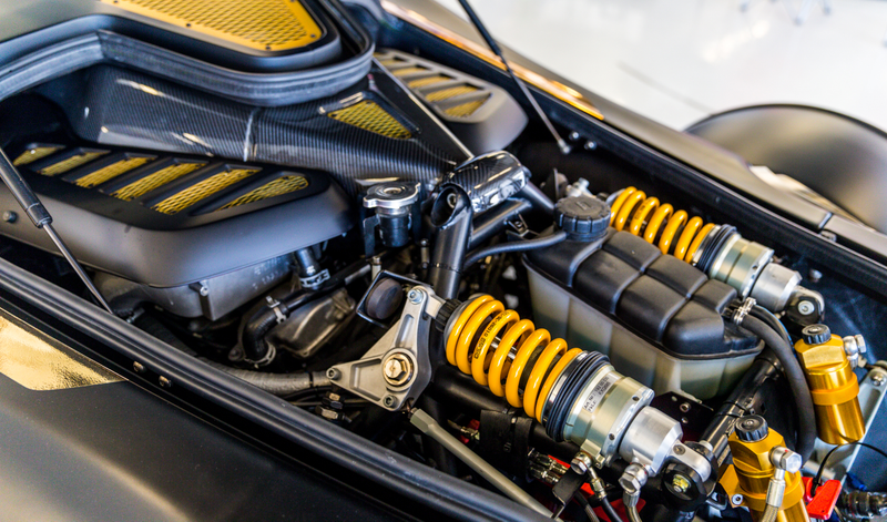 One very large twin-turbo Mercedes V12, perfectly color-coordinated with the rest of the suspension and engine bay because they can.